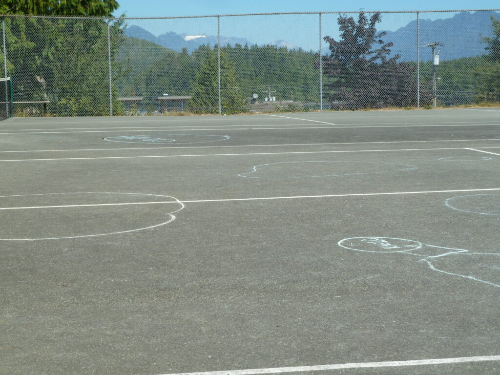 tofino-village-green-tennis-court