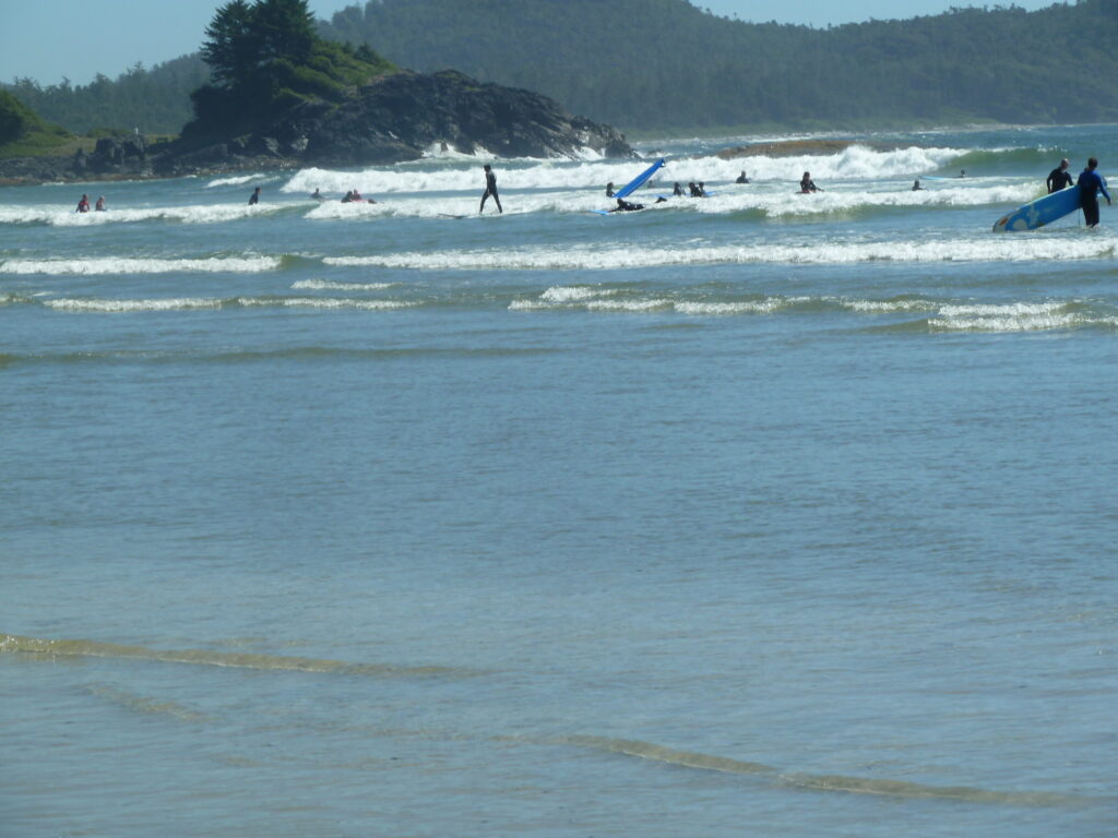 tennis-tourist-tofino-surfers-riding