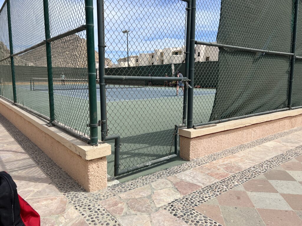 tennis-tourist-playa-grande-cabo-san-lucas-tennis-court-entrance-teri-church