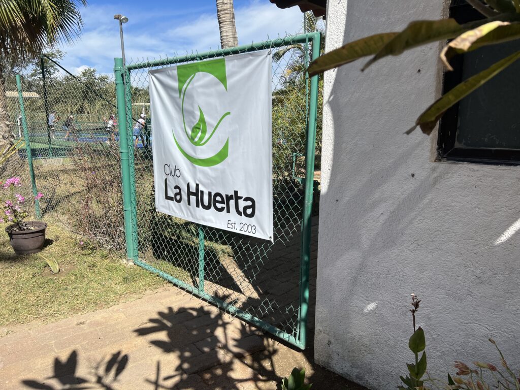 tennis tourist san jose del cabo mexico fence sign