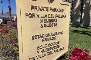 tennis-tourist-villa-del-palmar-cabo-san-lucas-mexico-parking-sign