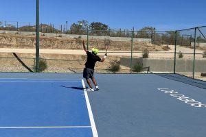 tennis-tourist-cabo-del-mar-cabo-san-lucas-sports-center-courts-player-serving-teri-church